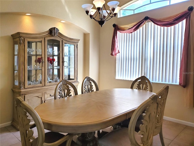 1057 Staley St, Port Charlotte, FL 33952 - dining space featuring baseboards, a wealth of natural light, an inviting chandelier, and light tile patterned floors