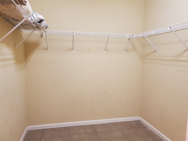 1057 Staley St, Port Charlotte, FL 33952 - spacious closet with tile patterned flooring