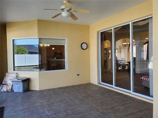 1057 Staley St, Port Charlotte, FL 33952 - view of patio featuring a ceiling fan