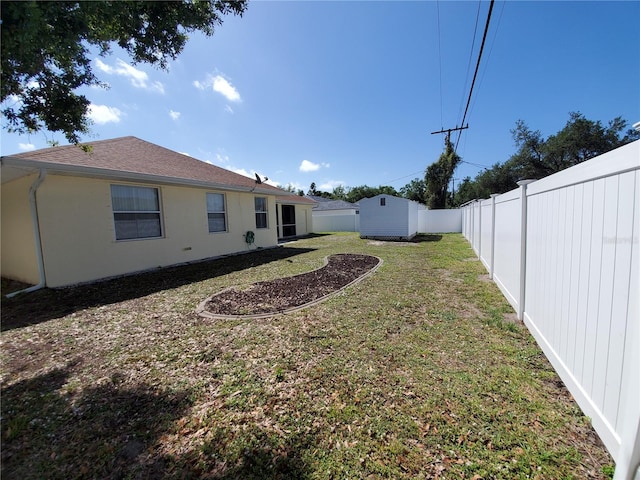 1057 Staley St, Port Charlotte, FL 33952 - view of yard featuring a fenced backyard