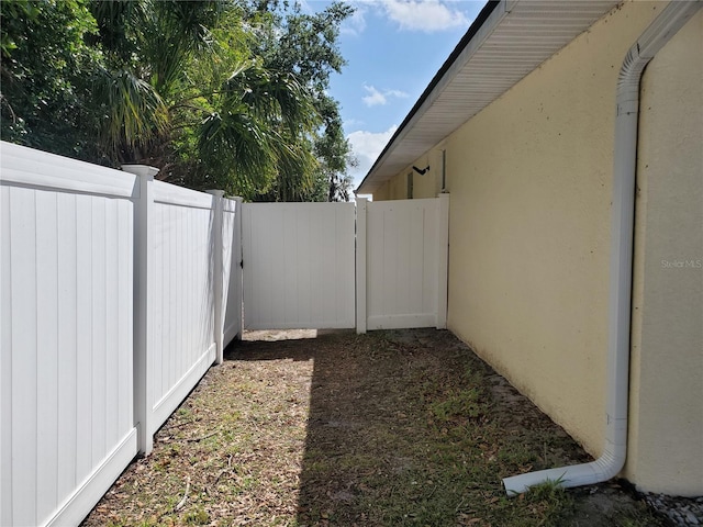 1057 Staley St, Port Charlotte, FL 33952 - view of yard featuring a fenced backyard