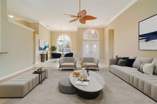 tiled living room featuring crown molding and ceiling fan