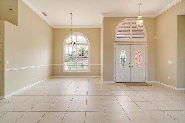 foyer with crown molding, a notable chandelier, and light tile patterned floors