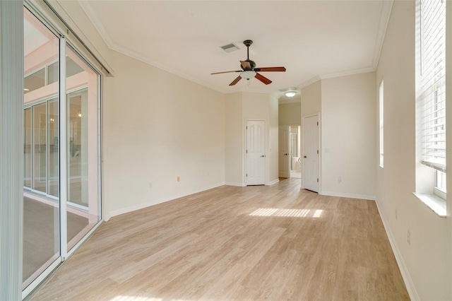 spare room featuring ornamental molding, ceiling fan, and light hardwood / wood-style flooring