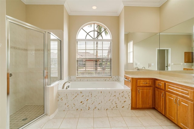 bathroom with vanity, crown molding, tile patterned floors, and independent shower and bath