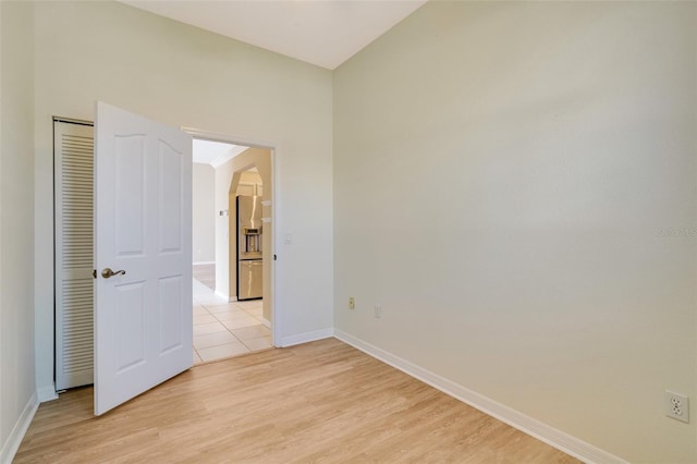 empty room with light wood-type flooring