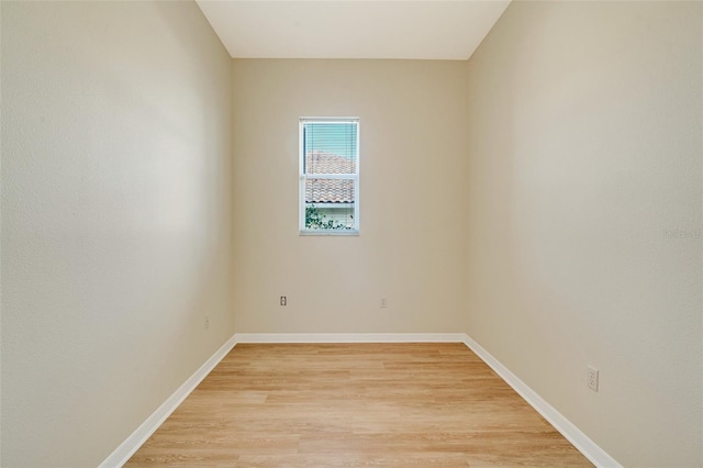 spare room featuring light hardwood / wood-style floors