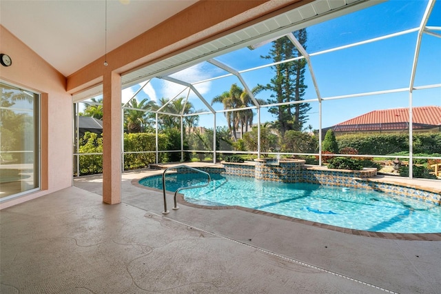 view of pool with a lanai and a patio area