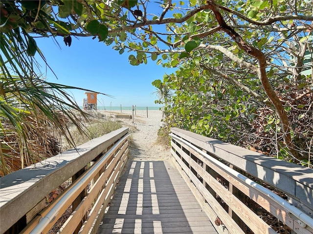 view of home's community with a view of the beach and a water view