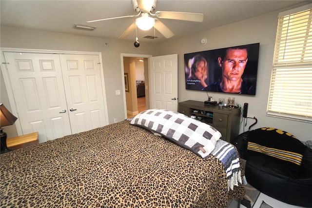 bedroom featuring a closet and ceiling fan