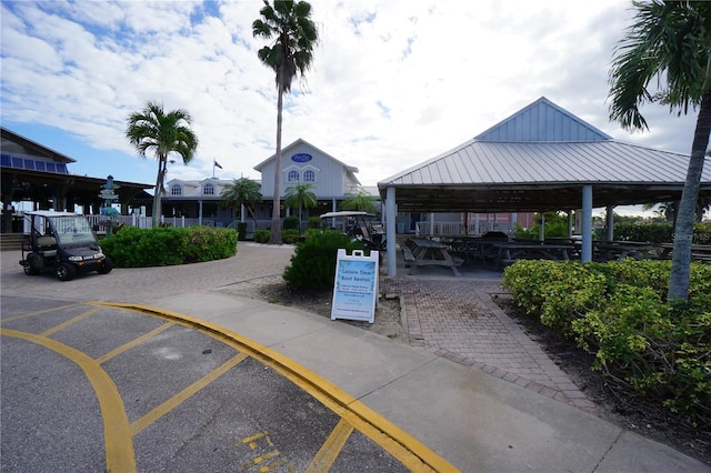 view of vehicle parking with a gazebo