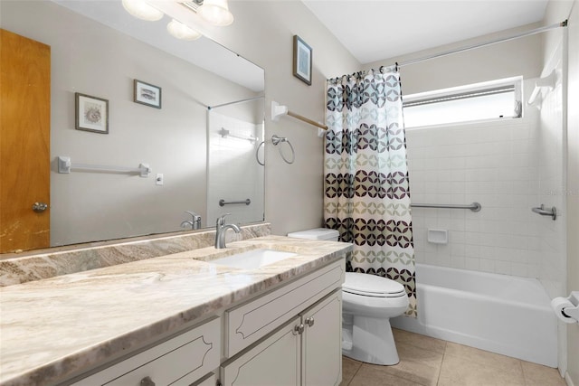 full bathroom featuring shower / bath combination with curtain, vanity, tile patterned floors, and toilet