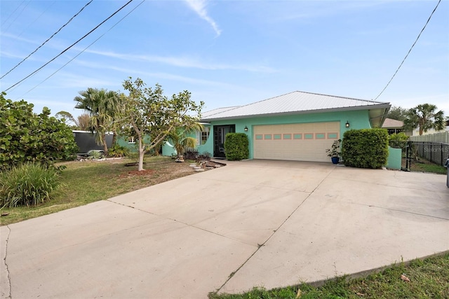 single story home with a garage