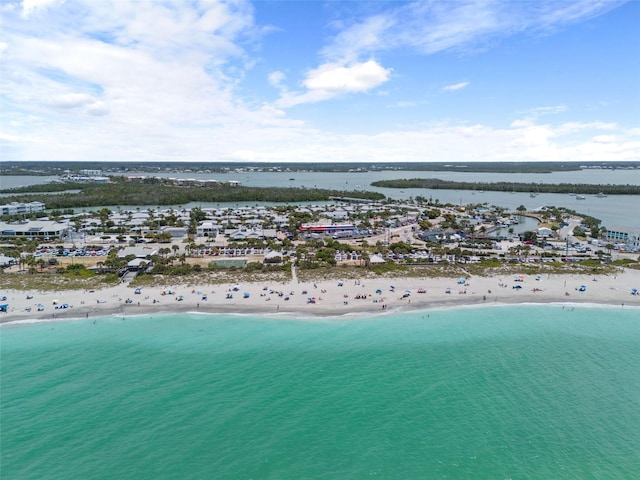 bird's eye view with a view of the beach and a water view