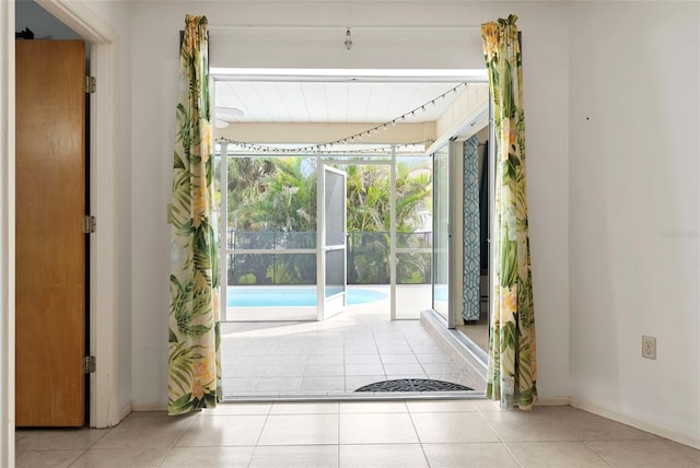 entryway featuring light tile patterned floors