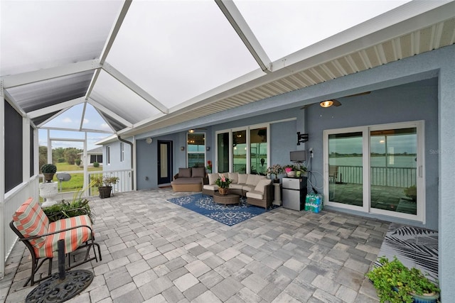 sunroom / solarium with vaulted ceiling