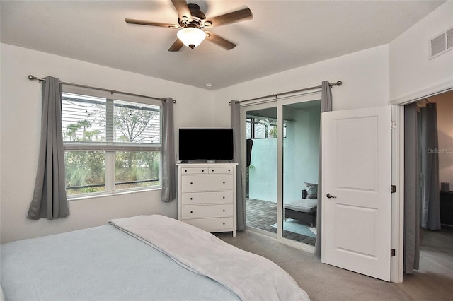 carpeted bedroom featuring access to outside and ceiling fan