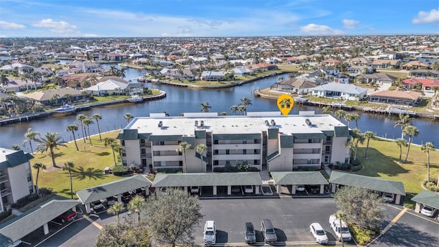 bird's eye view with a water view