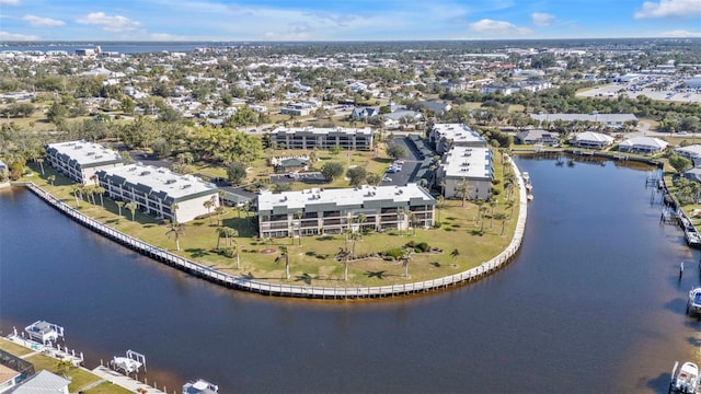 drone / aerial view with a water view