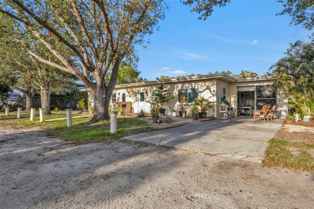 view of front of home featuring a patio area