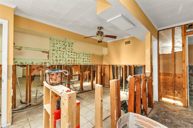 miscellaneous room featuring ceiling fan and crown molding