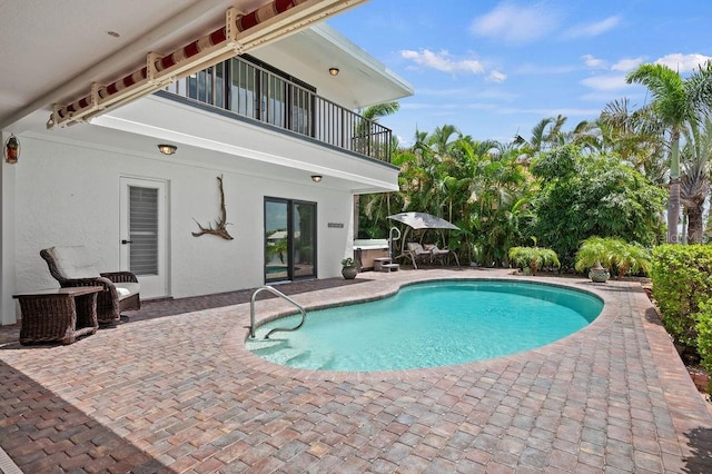 view of pool with a patio