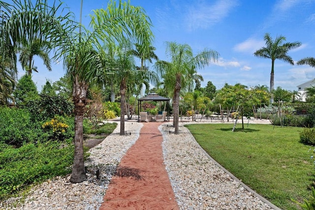 view of community with a gazebo and a lawn