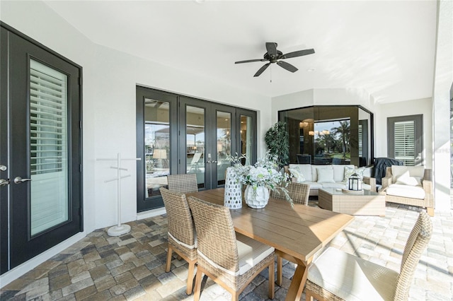 sunroom with french doors and ceiling fan