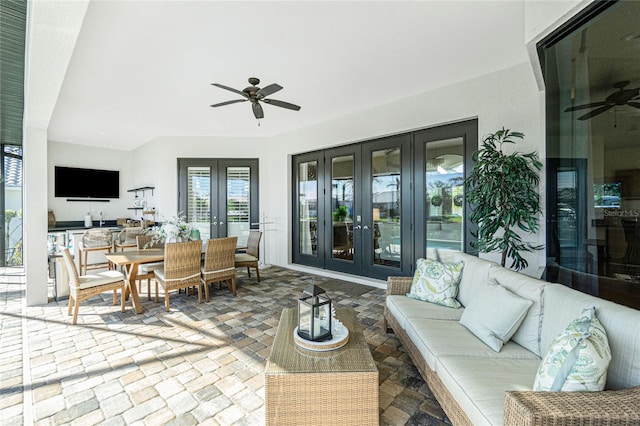 view of patio with ceiling fan, french doors, and an outdoor living space