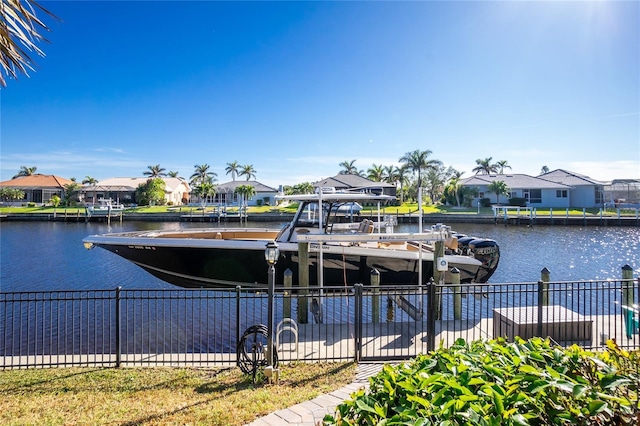 dock area featuring a water view