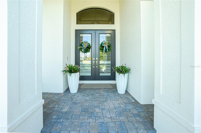 doorway to property featuring french doors