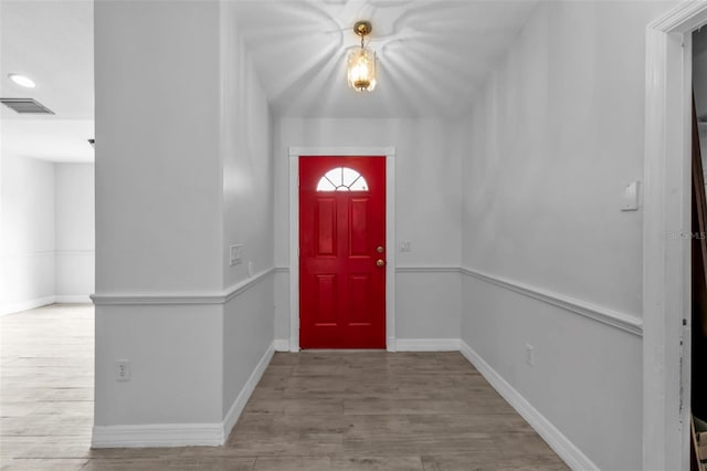 foyer with hardwood / wood-style floors