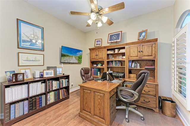 office area with ceiling fan and light hardwood / wood-style flooring