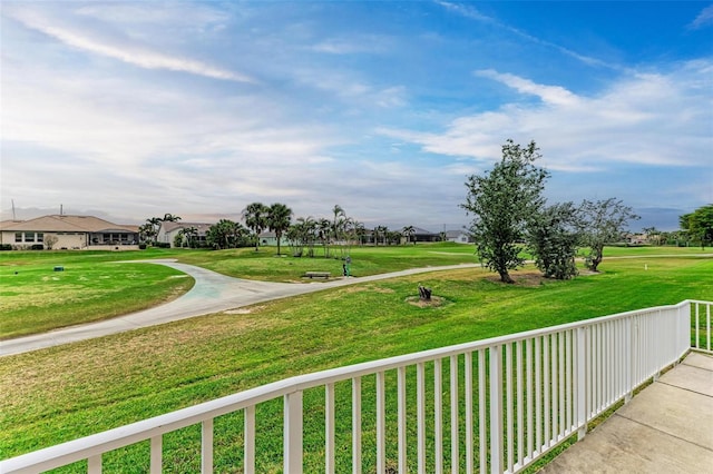 view of home's community featuring a yard