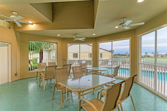 dining room featuring ceiling fan