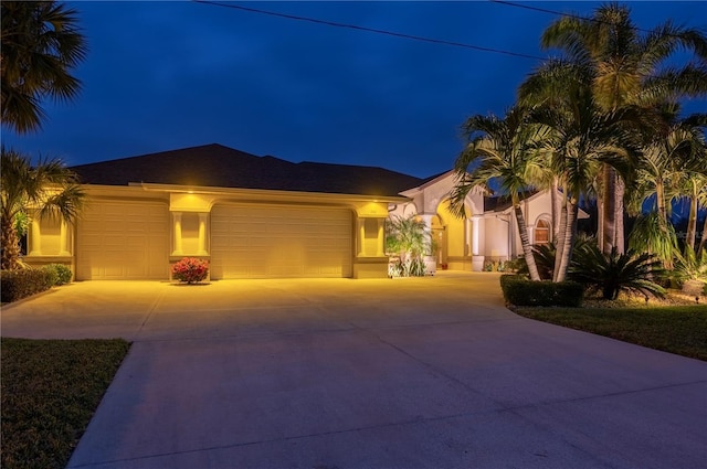 view of front of home with a garage