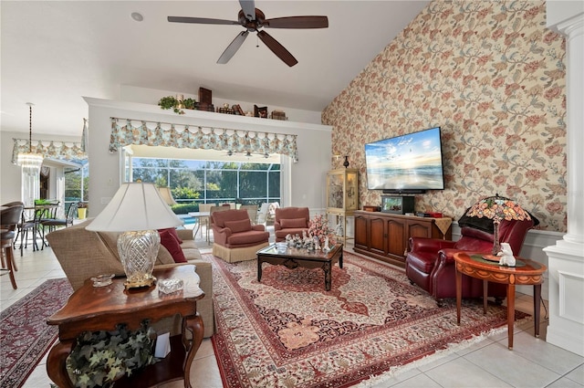 tiled living room with ornate columns and ceiling fan