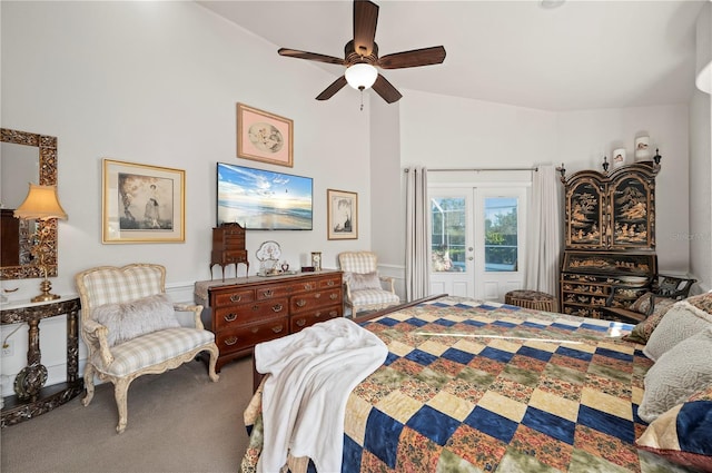 bedroom featuring ceiling fan, french doors, vaulted ceiling, and carpet