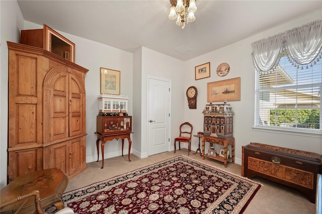 living area with light colored carpet