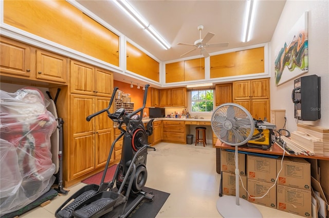 workout area with ceiling fan