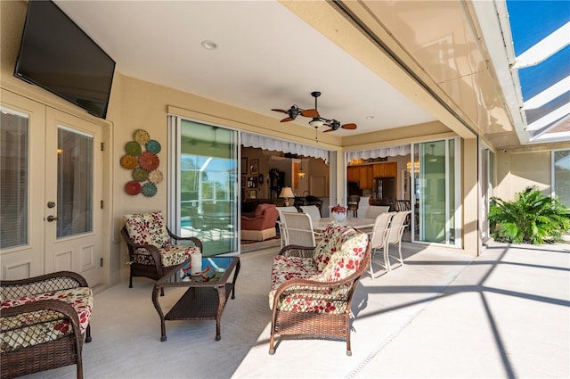 view of patio / terrace with ceiling fan, french doors, and an outdoor hangout area