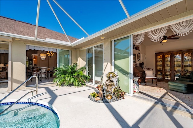 exterior space featuring ceiling fan and french doors