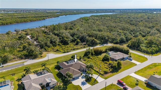 drone / aerial view with a water view