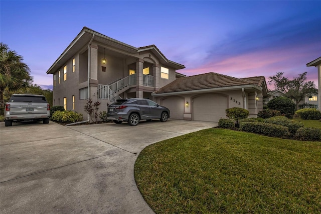 view of front of home with a yard