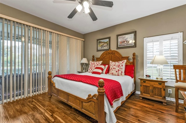 bedroom with ceiling fan and dark wood-type flooring