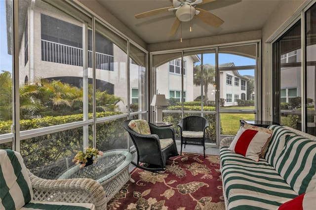 sunroom / solarium with ceiling fan