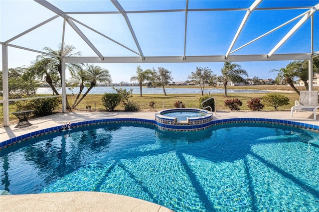 view of swimming pool featuring a patio, a lanai, an in ground hot tub, and a water view