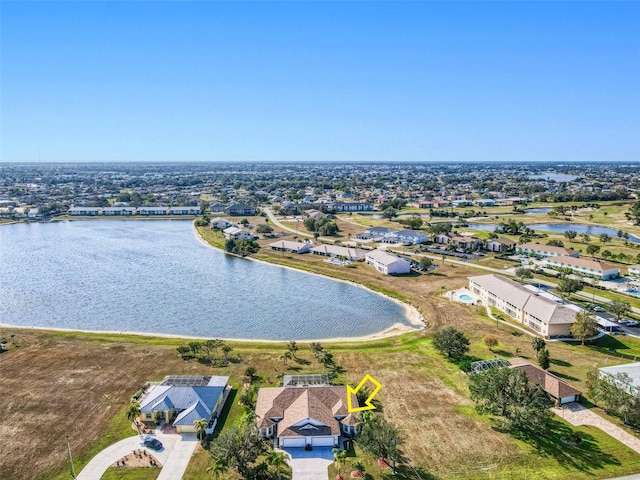 drone / aerial view with a water view