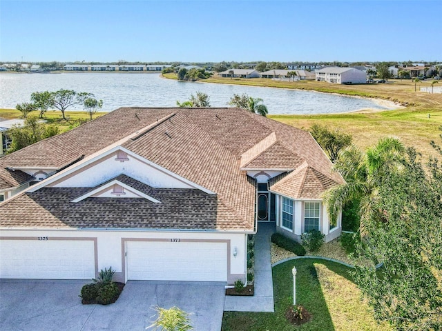 bird's eye view with a water view