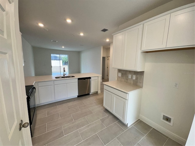 kitchen with a sink, visible vents, black electric range, dishwasher, and tasteful backsplash